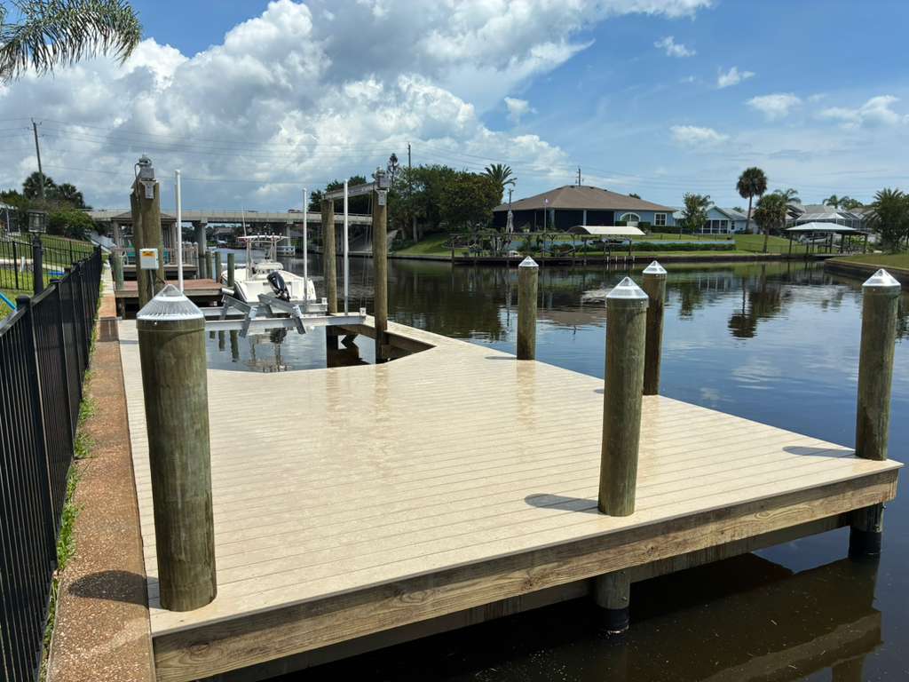 Completed dock and deck project on a residential canal